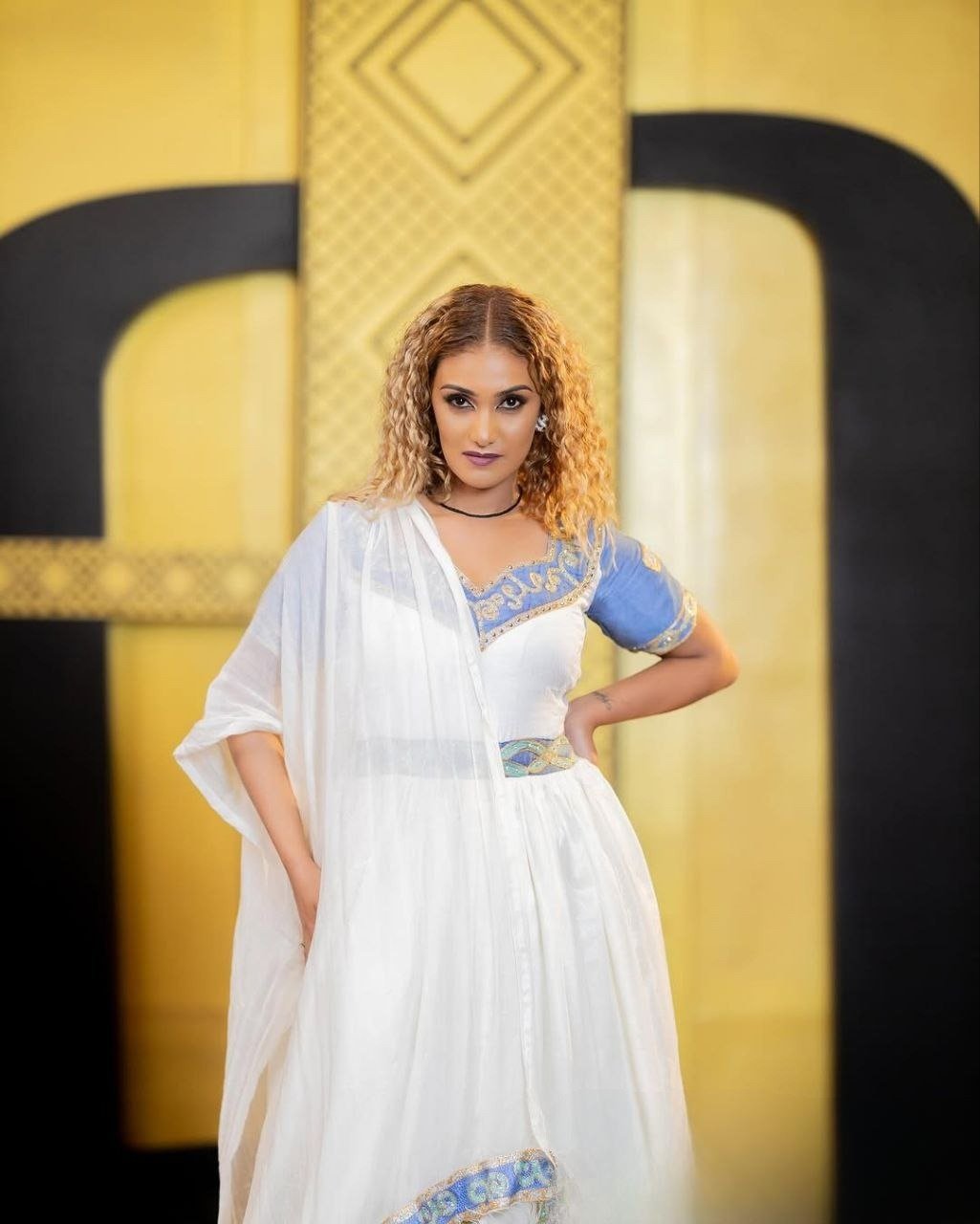 ELEGANT ETHIOPIAN TRADITIONAL DRESS WITH BLUE AND GOLD ACCENT