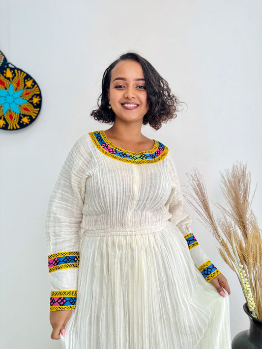 Handwoven Ethiopian Habesha Kemis – White Cotton Dress with Colorful Traditional Tibeb Embroidery | Cultural & Elegant Wear for Special Occasions Hab187