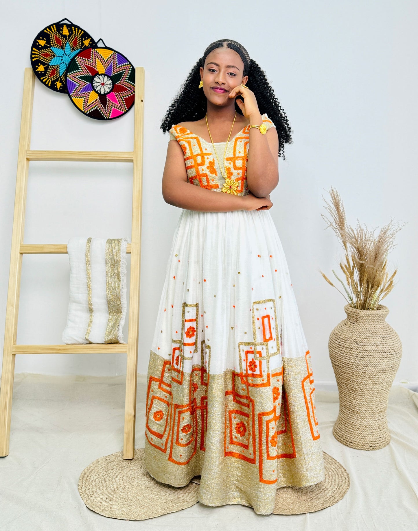 Elegant Orange Wedding Habesha Dress with Intricate Patterns Hab47