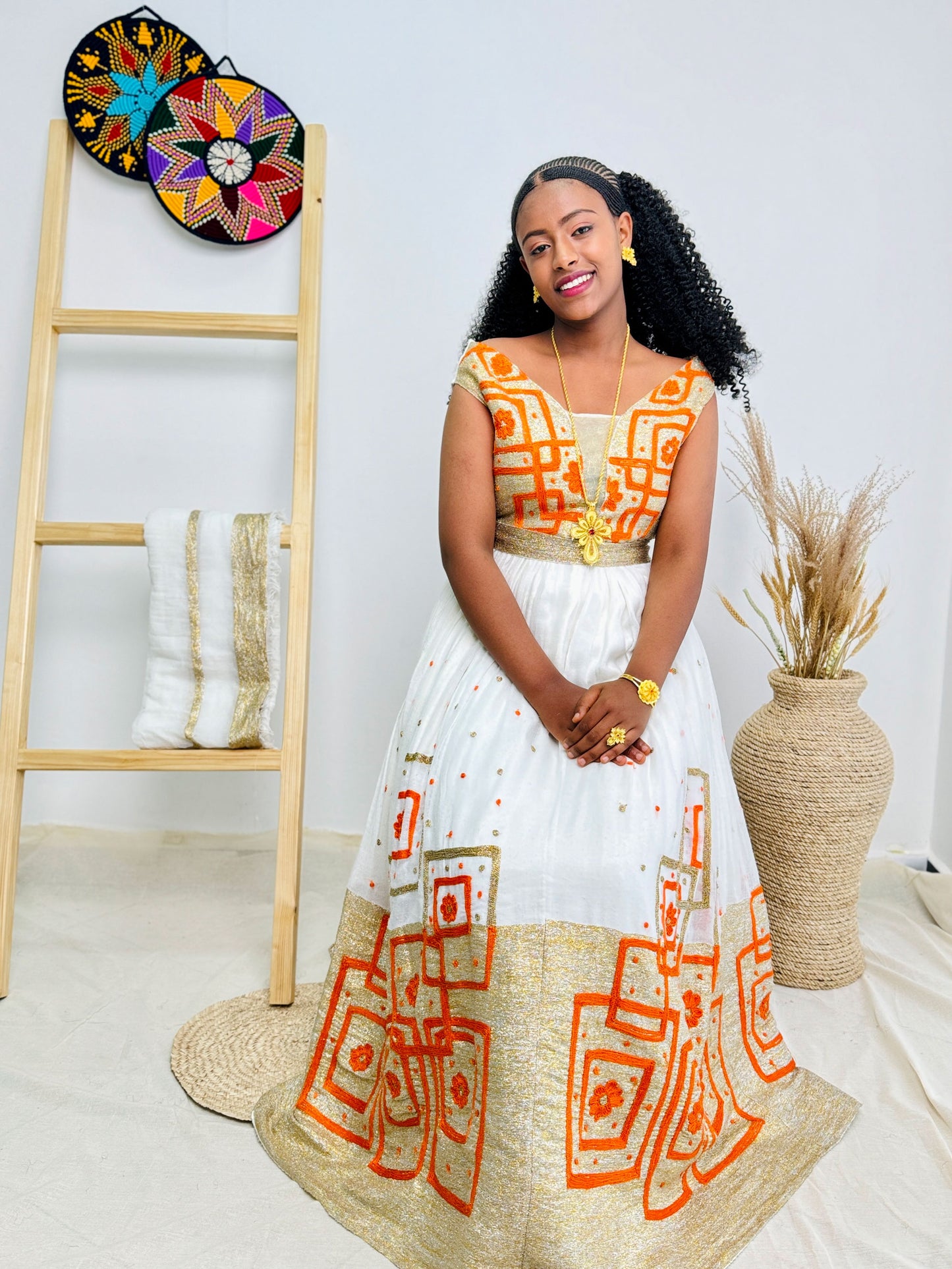 Elegant Orange Wedding Habesha Dress with Intricate Patterns Hab47