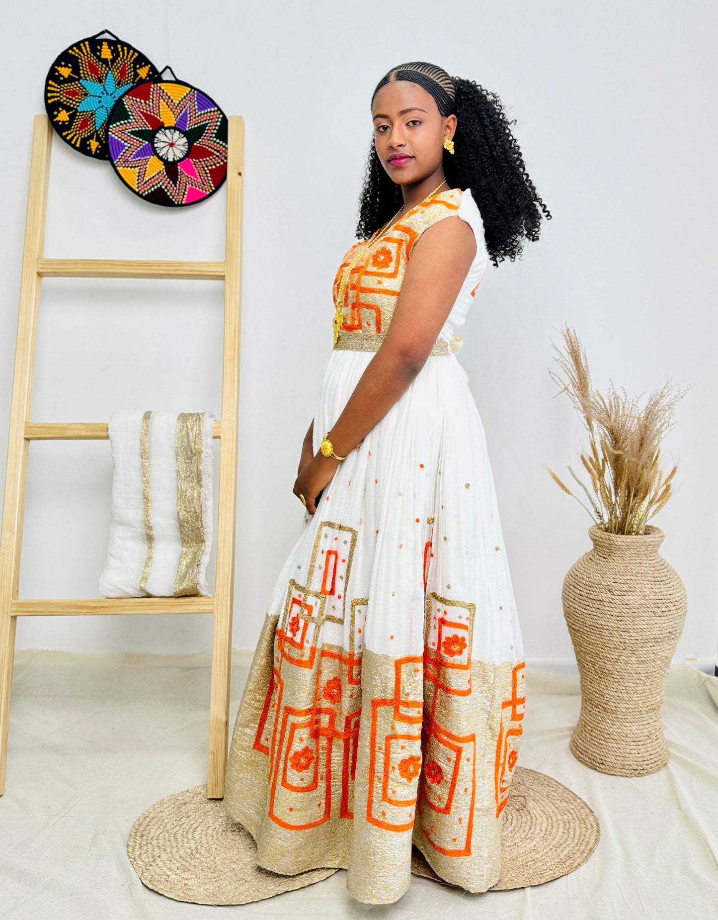 Elegant Orange Wedding Habesha Dress with Intricate Patterns Hab47