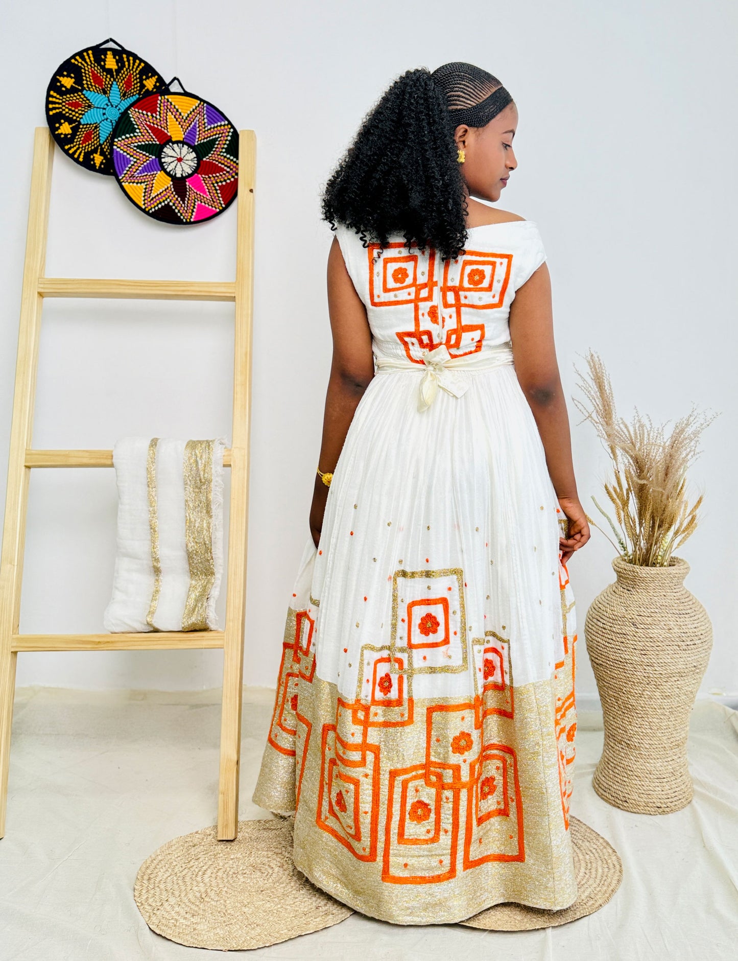 Elegant Orange Wedding Habesha Dress with Intricate Patterns Hab47