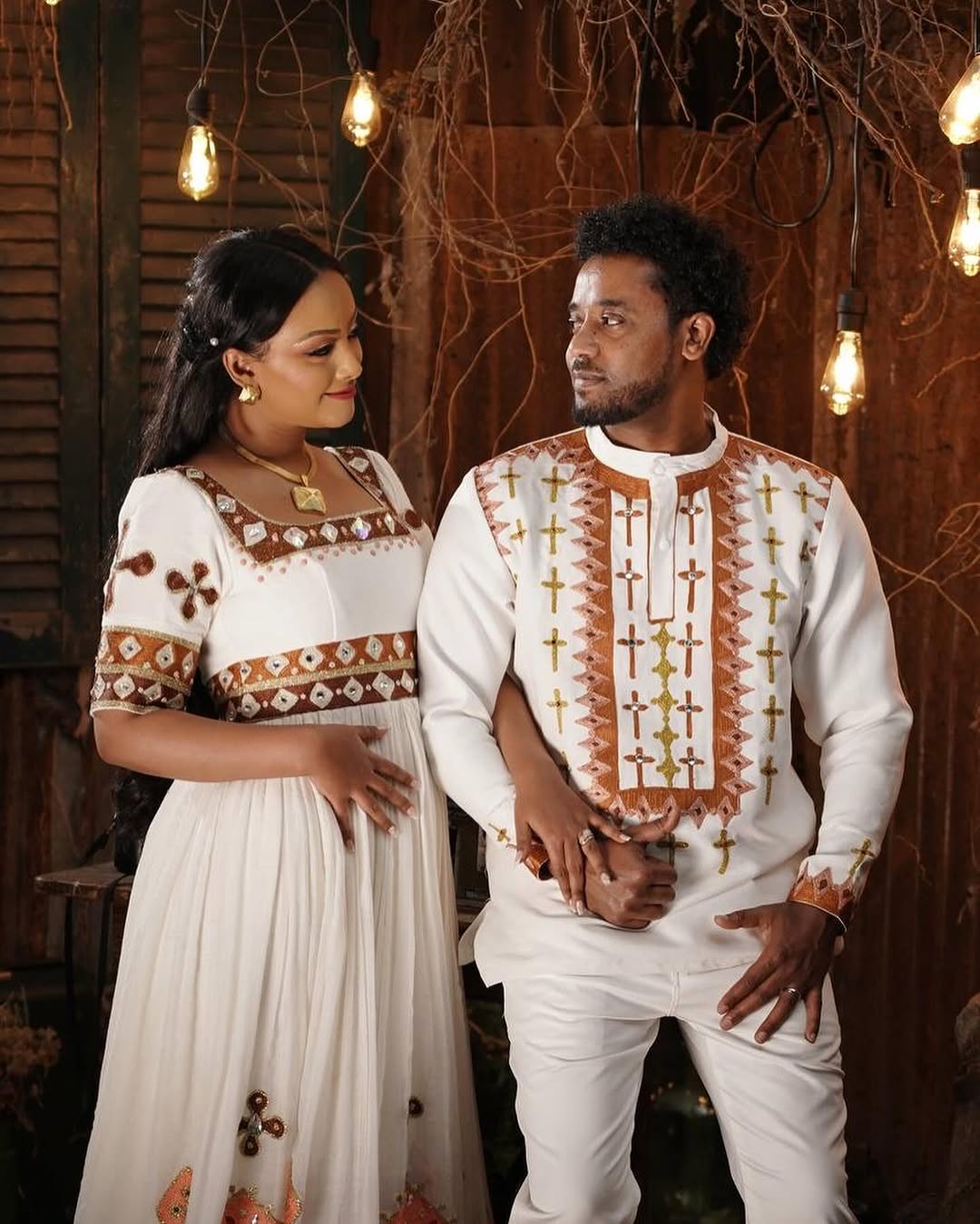ELSHU ETHIOPIAN COUPLE’S HABESHA KEMIS & JODET SET | ORANGE CROSS EMBROIDERY HABESHA COUPLE'S OUTFIT | TRADITIONAL COUPLE'S OUTFIT
