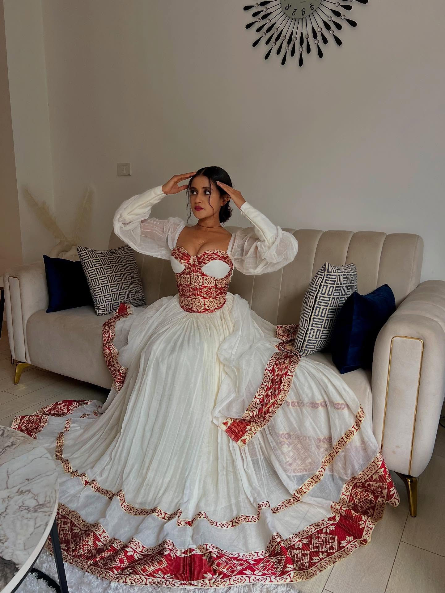 ARIAM ROYAL TRADITIONAL ETHIOPIAN WEDDING DRESS | RED AND GOLD WOVEN PATTERN HABESHA KEMIS | VIBRANT HABESHA DRESS FOR WEDDING