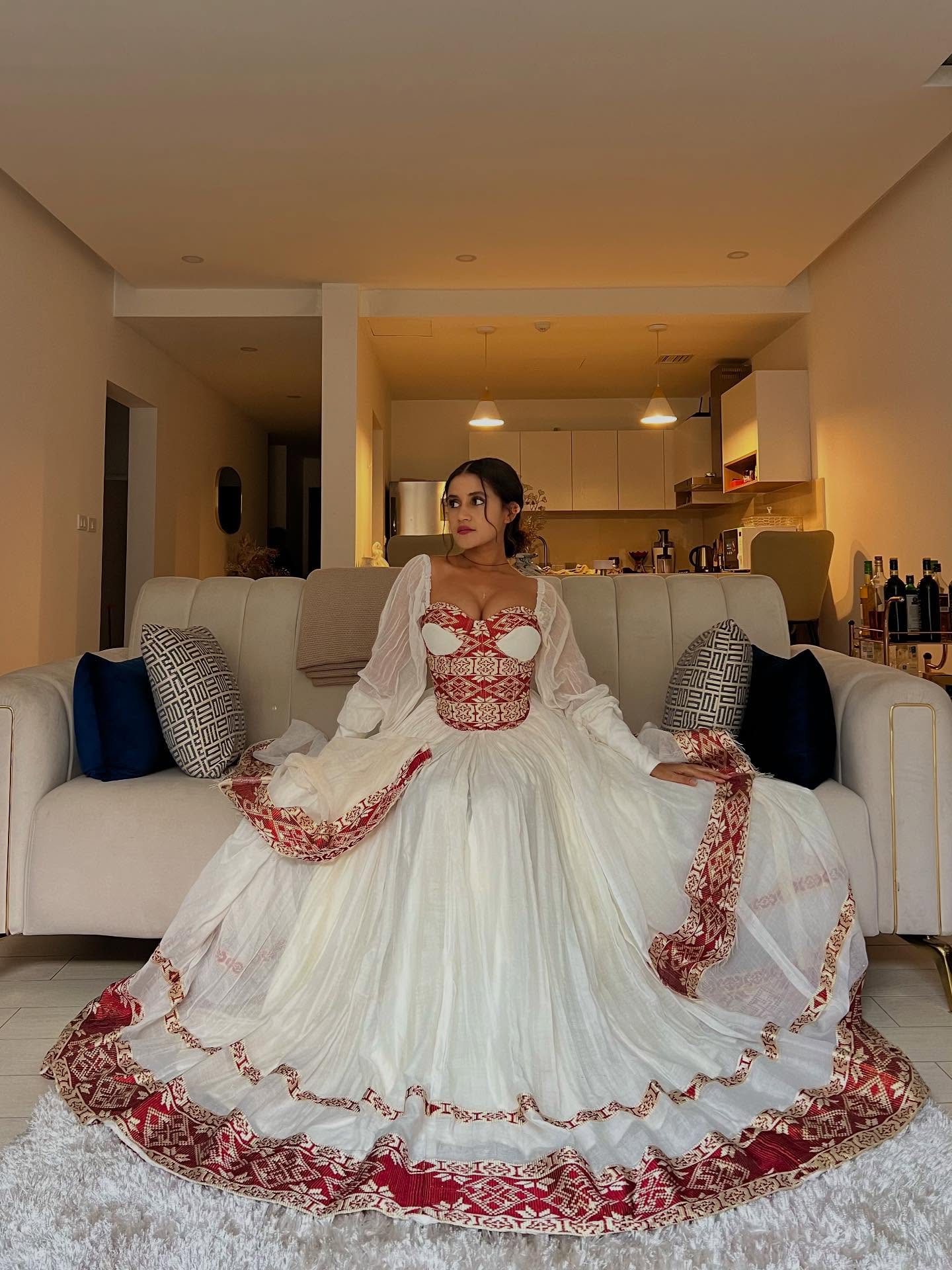 ARIAM ROYAL TRADITIONAL ETHIOPIAN WEDDING DRESS | RED AND GOLD WOVEN PATTERN HABESHA KEMIS | VIBRANT HABESHA DRESS FOR WEDDING