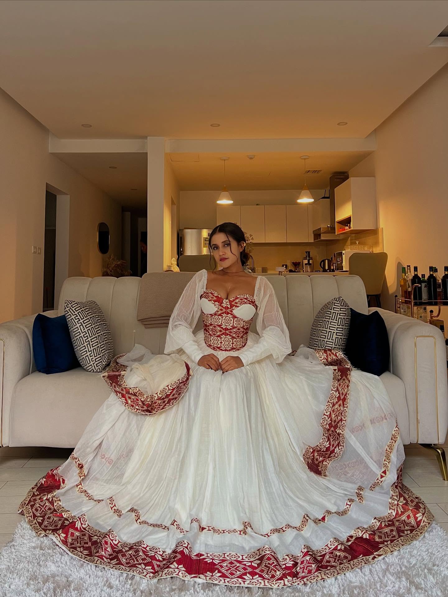 ARIAM ROYAL TRADITIONAL ETHIOPIAN WEDDING DRESS | RED AND GOLD WOVEN PATTERN HABESHA KEMIS | VIBRANT HABESHA DRESS FOR WEDDING