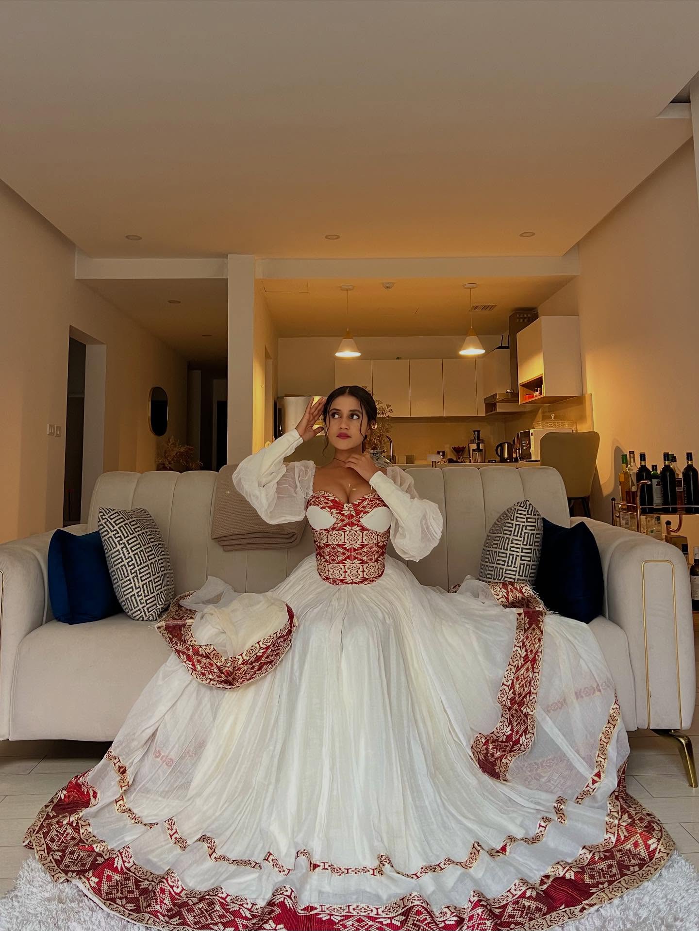 ARIAM ROYAL TRADITIONAL ETHIOPIAN WEDDING DRESS | RED AND GOLD WOVEN PATTERN HABESHA KEMIS | VIBRANT HABESHA DRESS FOR WEDDING